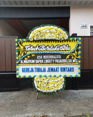 Papan Bunga Duka di Sajad